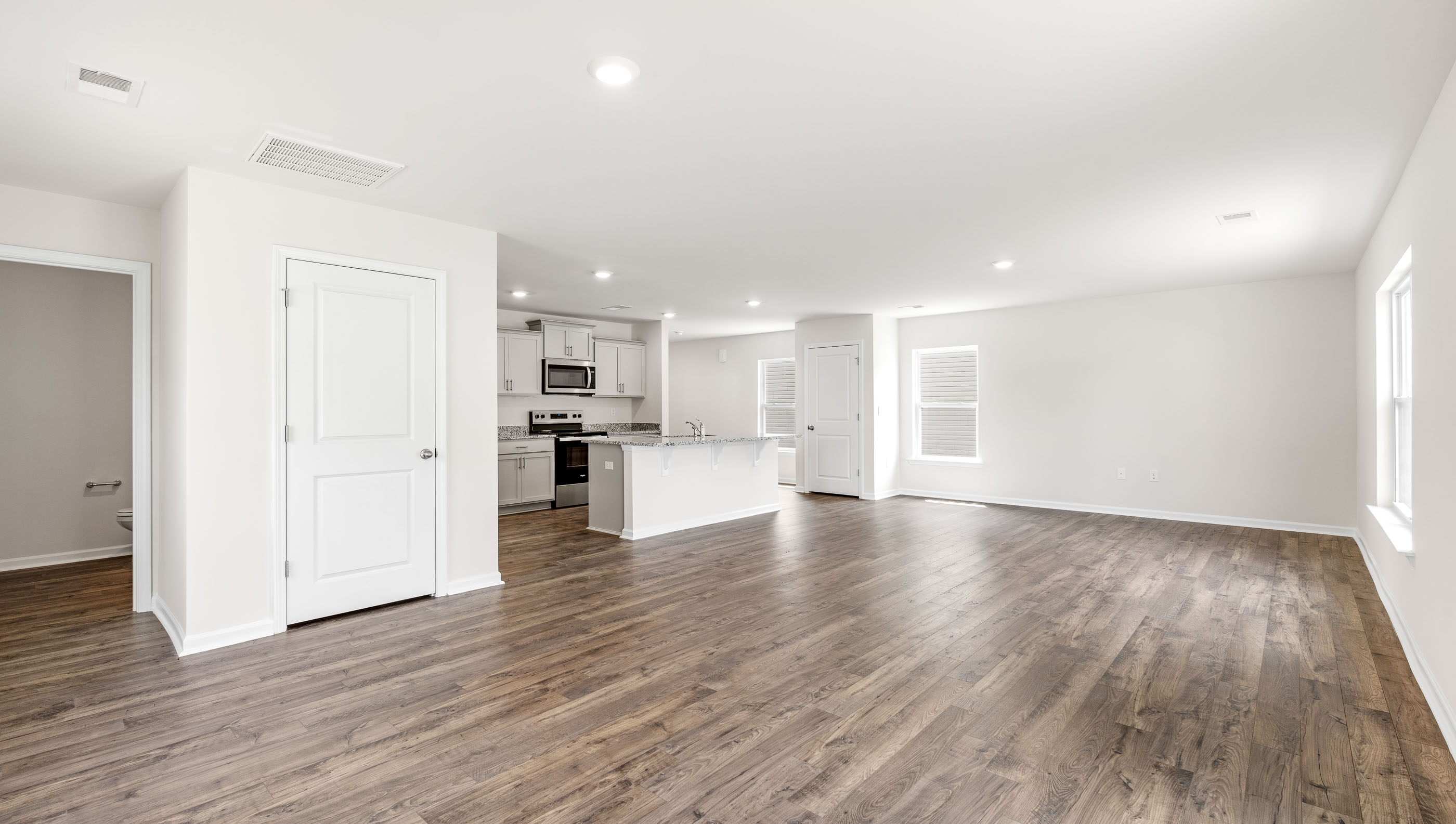 Family room with windows.
