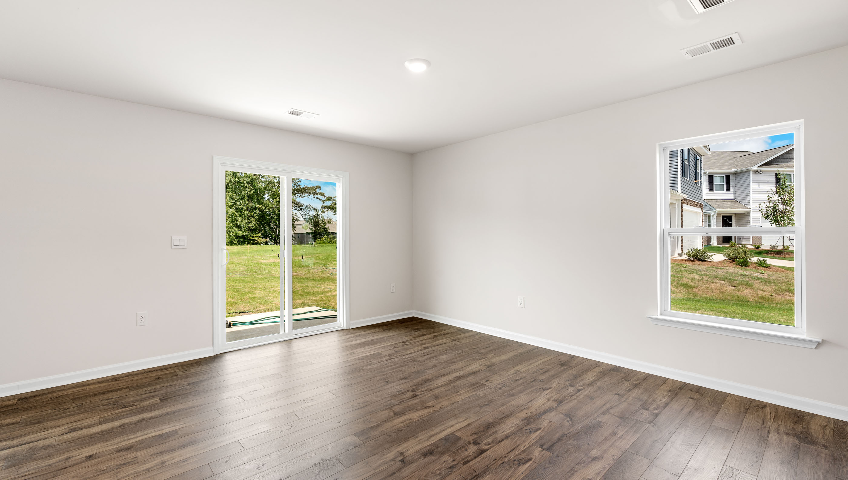 Family room with windows.
