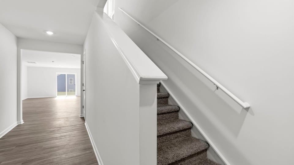 View of stairs to bedroom.