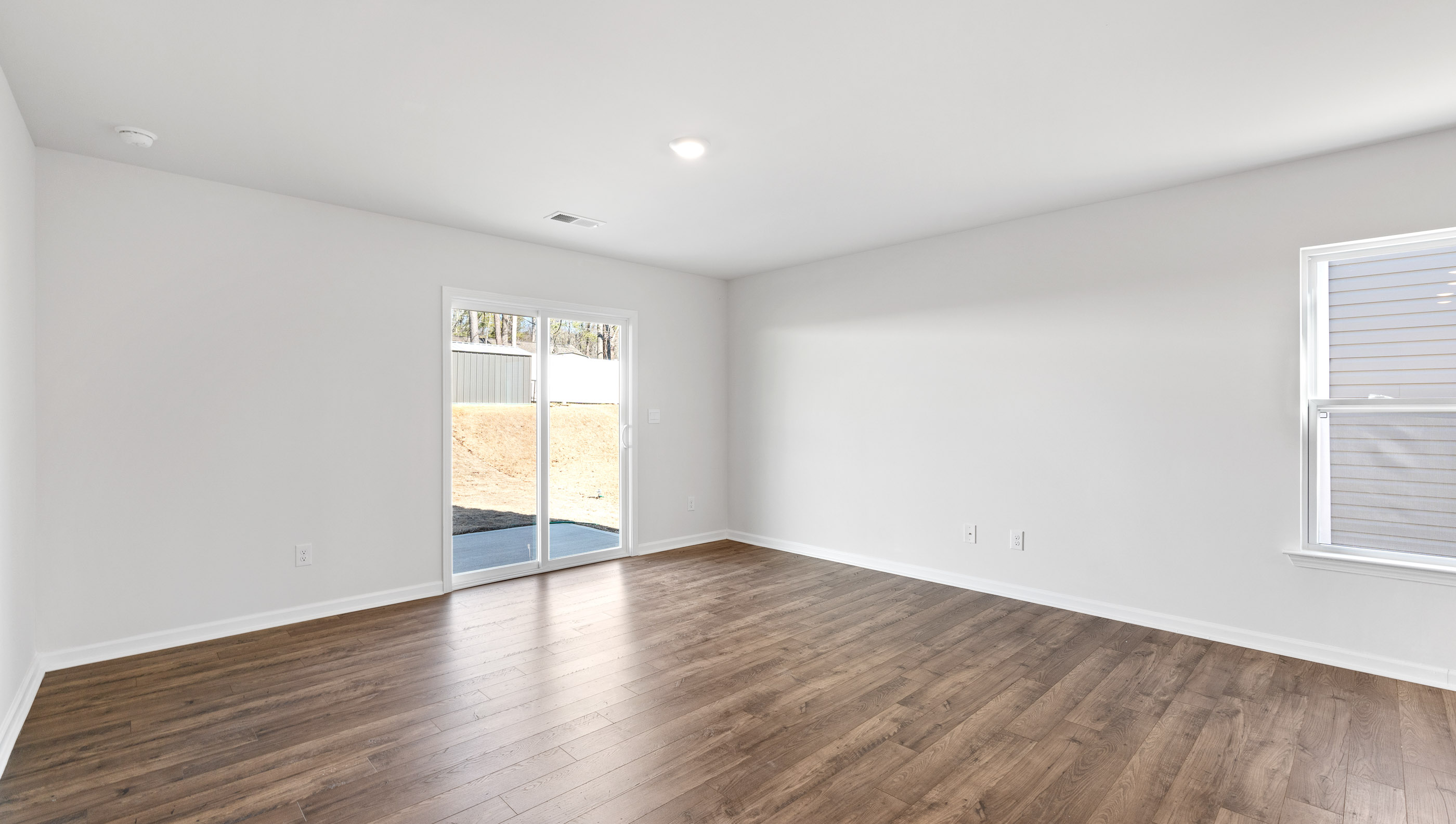 Livingroom with dining room of home.