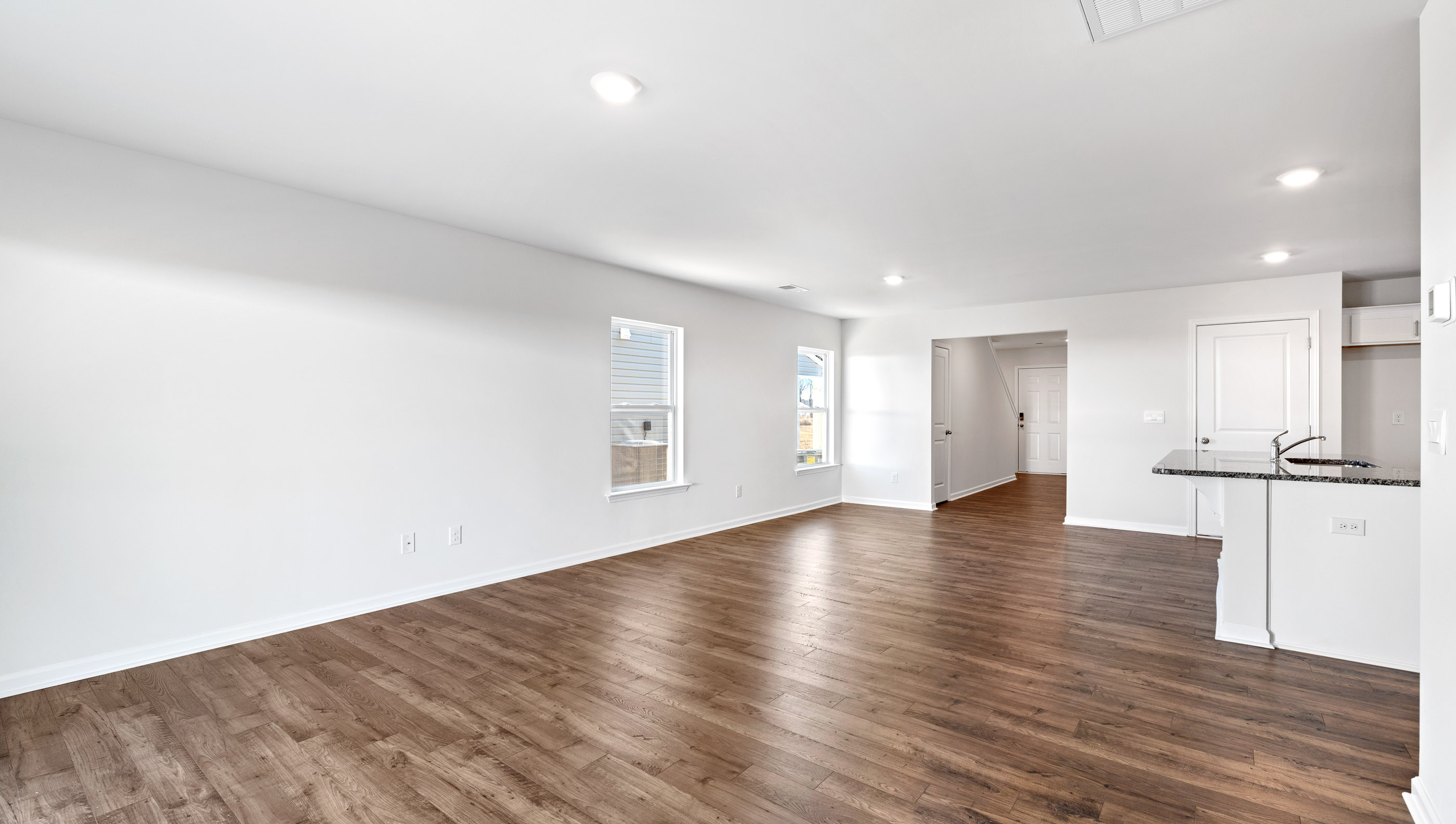 Livingroom with dining room of home.