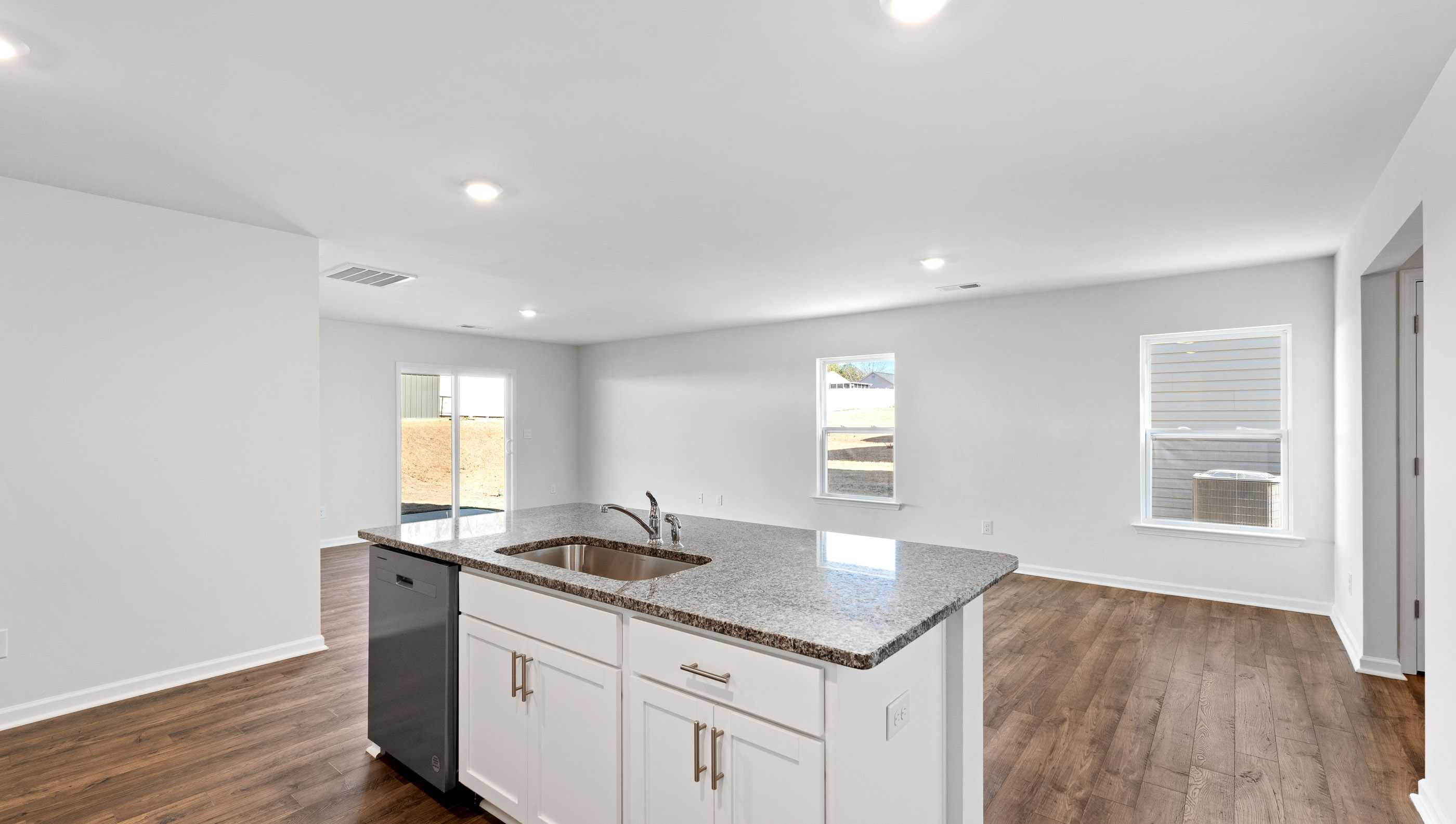 Kitchen with island and countertops.