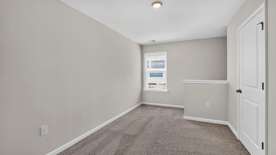 Landing space with carpet.