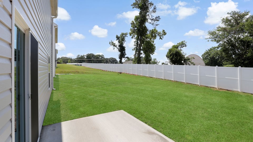 Large backyard of home.