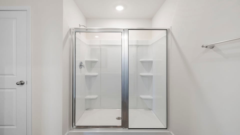 Bathroom with walk in shower.