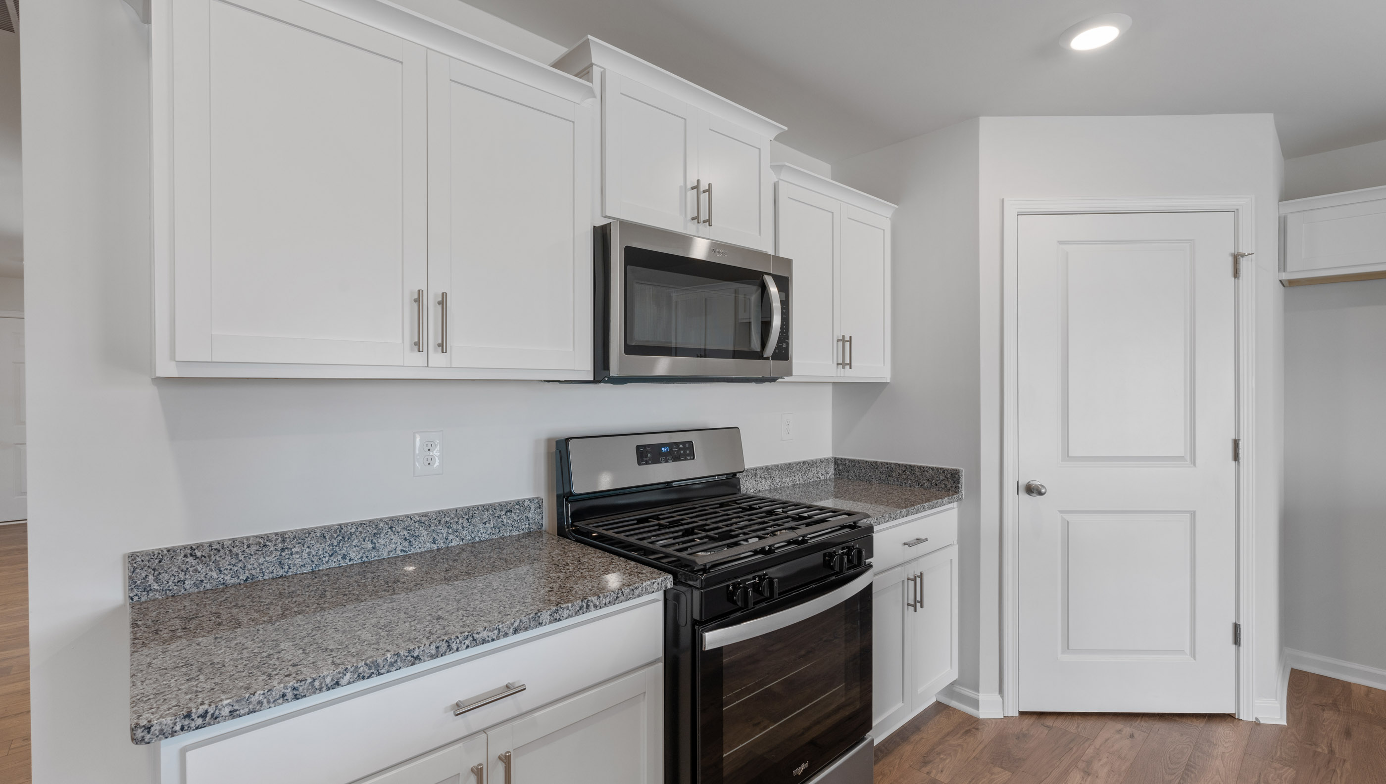Kitchen with stainless steel appliances.