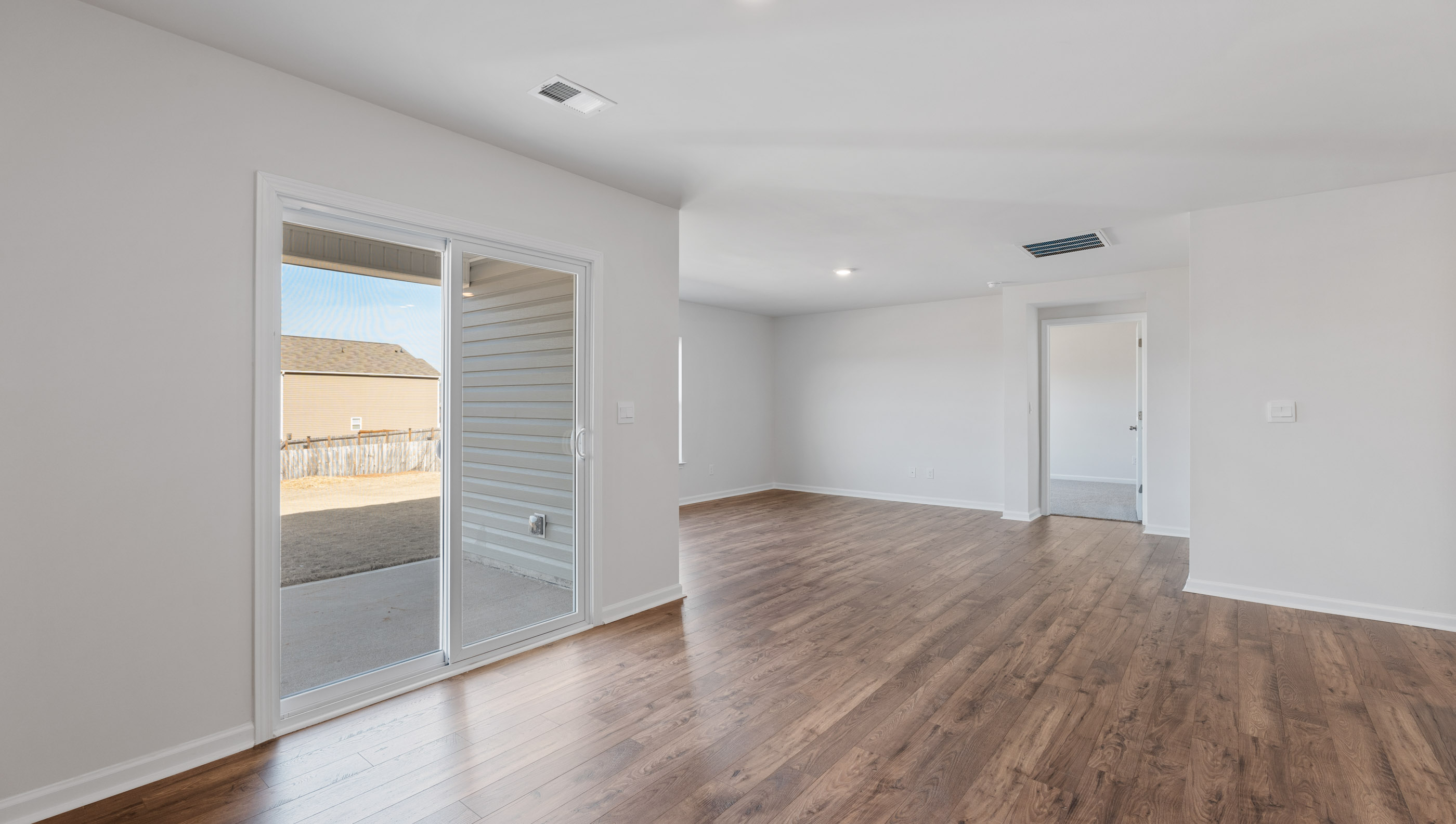 Family room with windows.