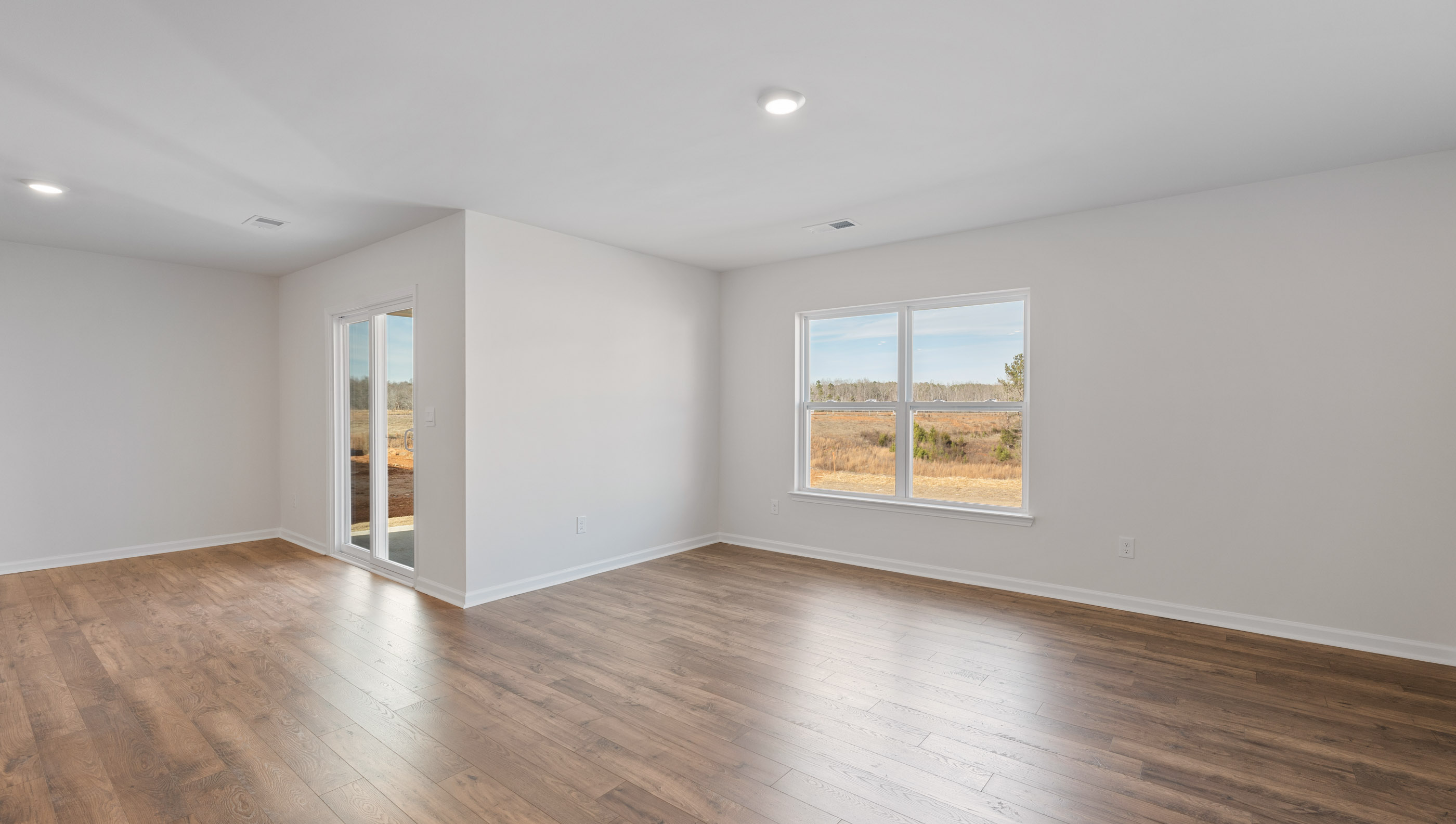 Family room with windows.