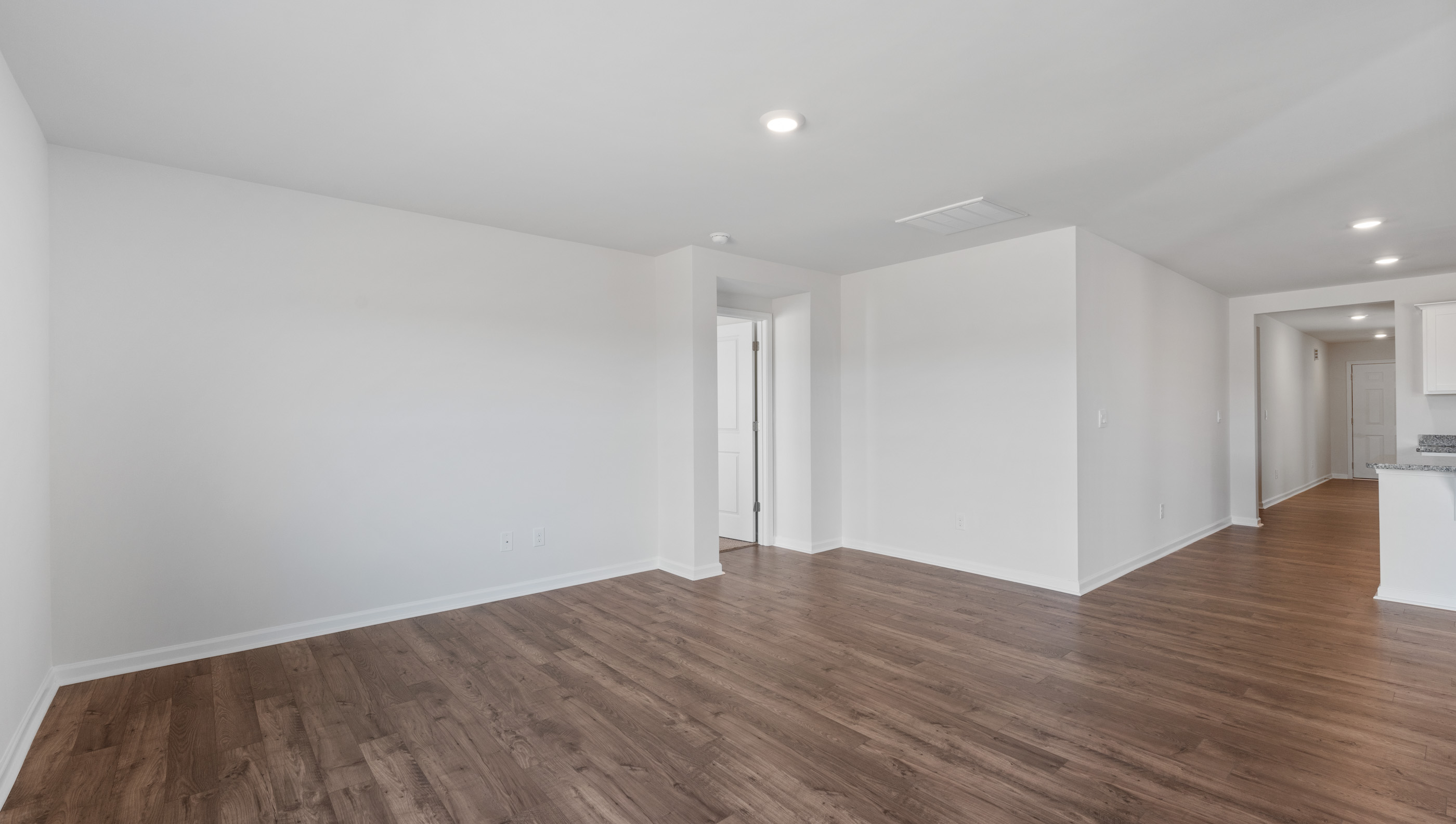 Family room with windows.