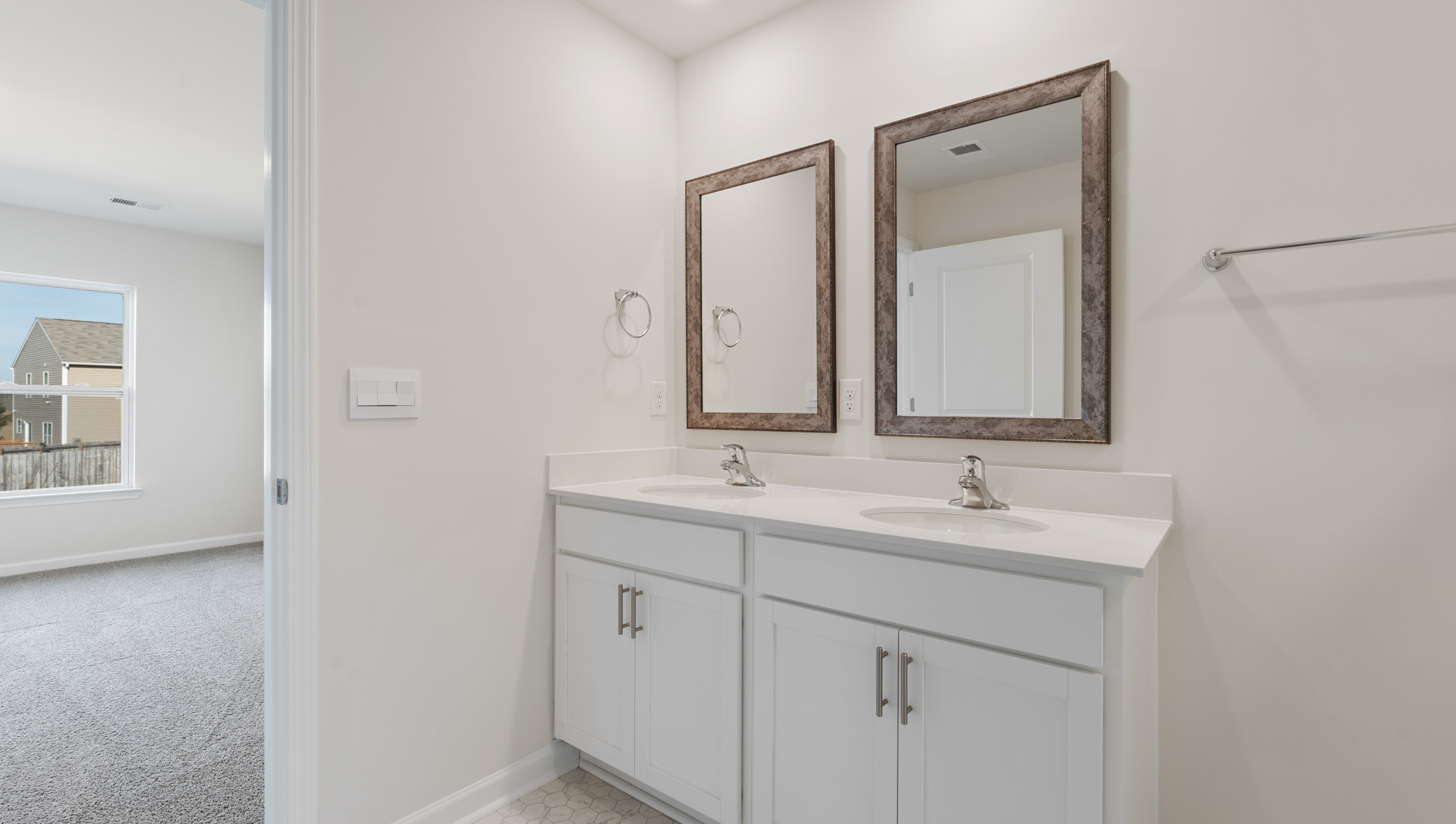 Bathroom with double vanity sink.