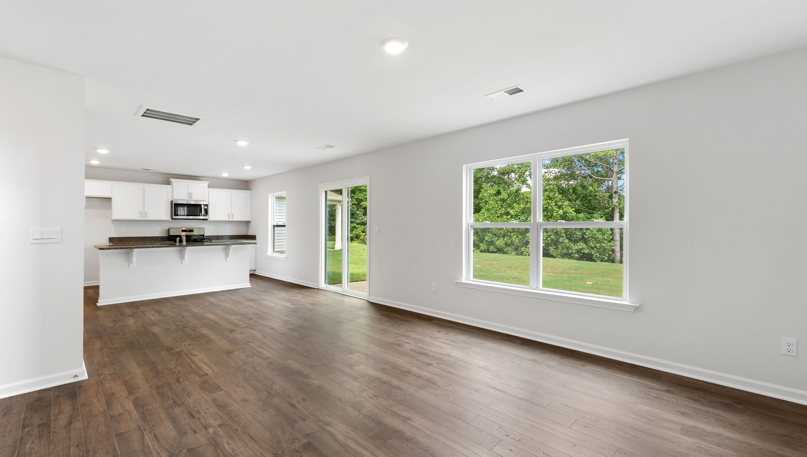 Family room with windows.