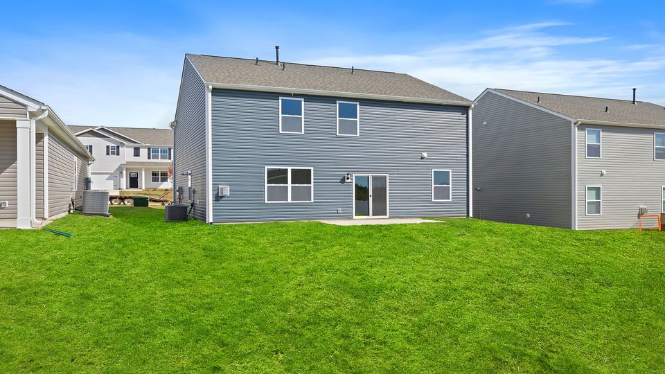 Large backyard of home.