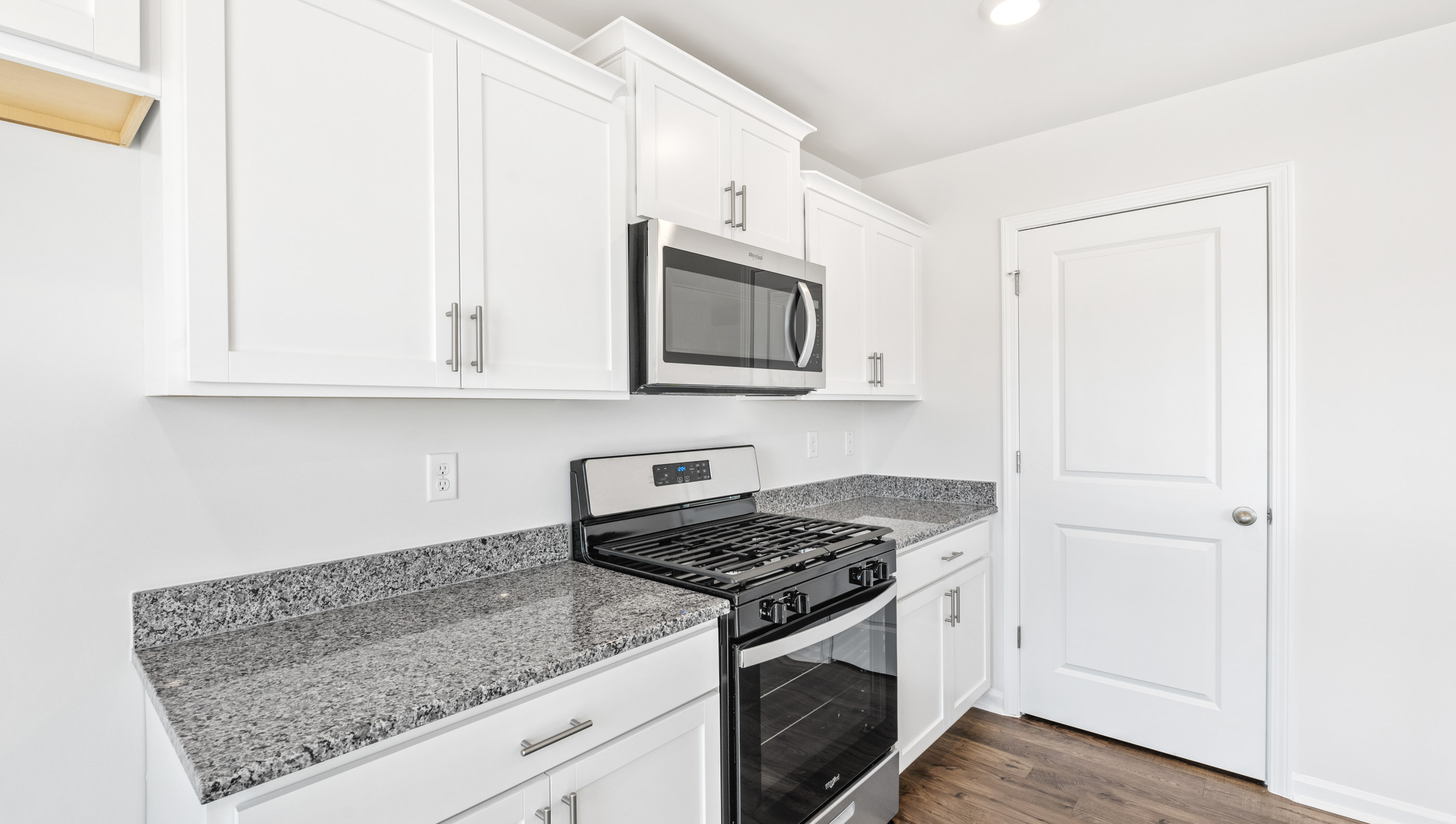 Kitchen with stainless steel appliances.