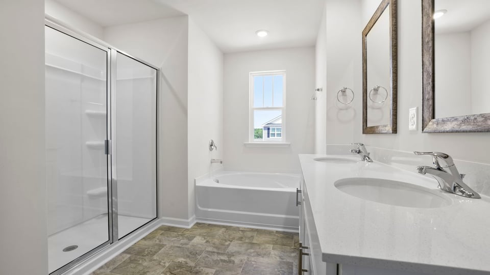 Bathroom with walk in shower.