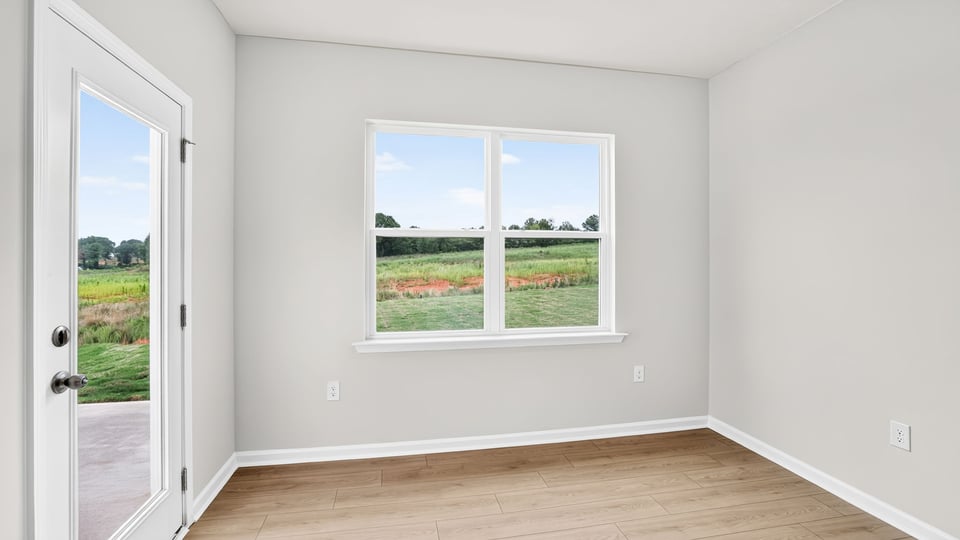 Dining area with windows and back door