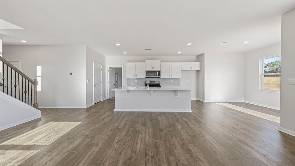 Living room facing kitchen.