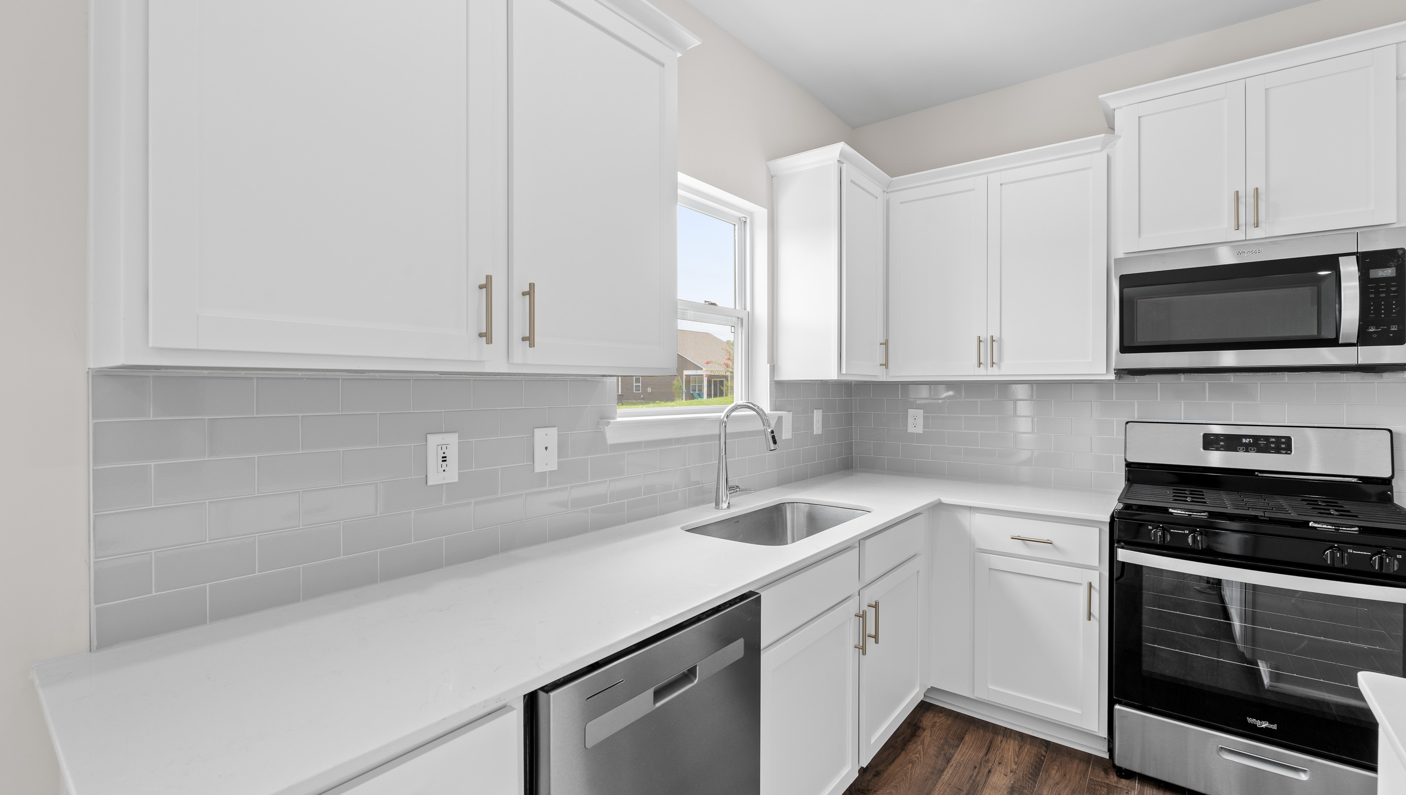 Kitchen with stainless steel appliances.