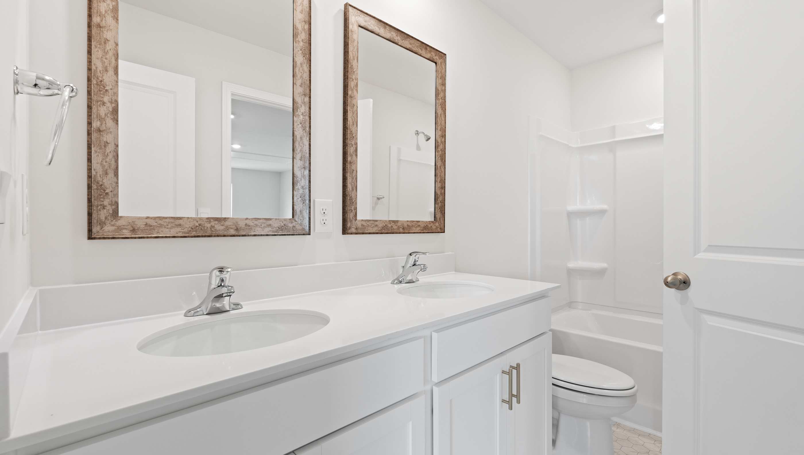 Bathroom with double vanity sink.