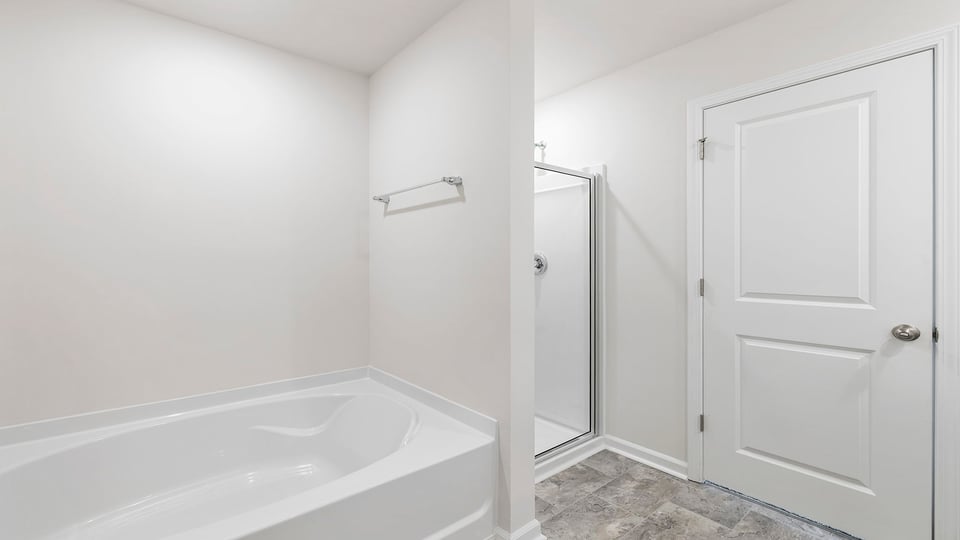 Bathroom with double vanity and shower.