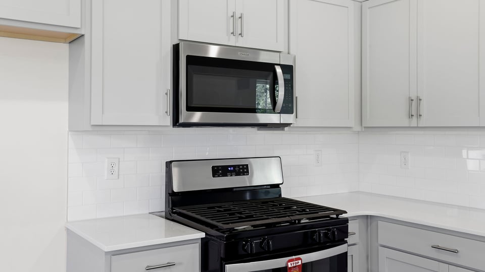 Kitchen with island and window.
