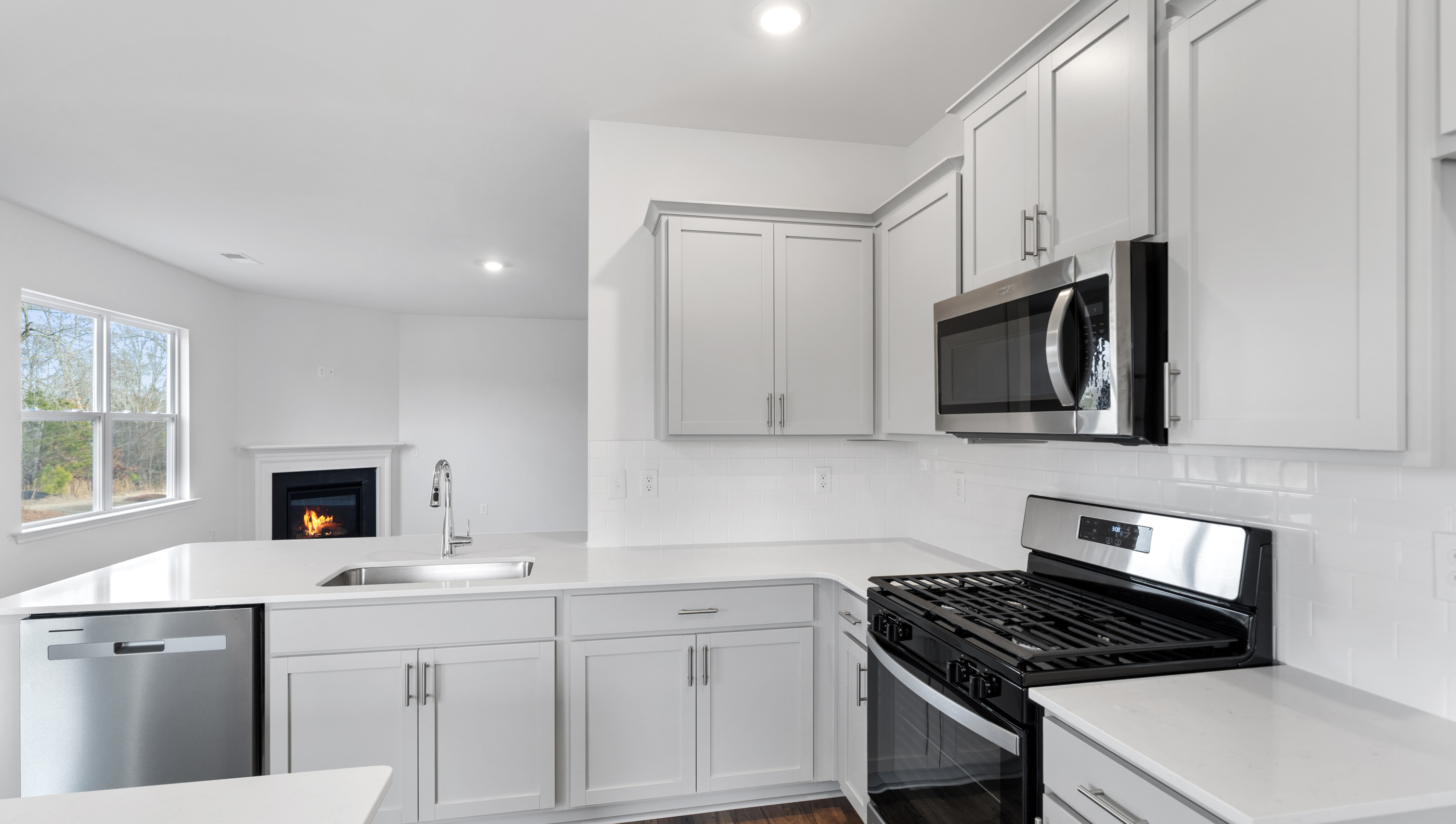 Kitchen with stainless steel appliances.