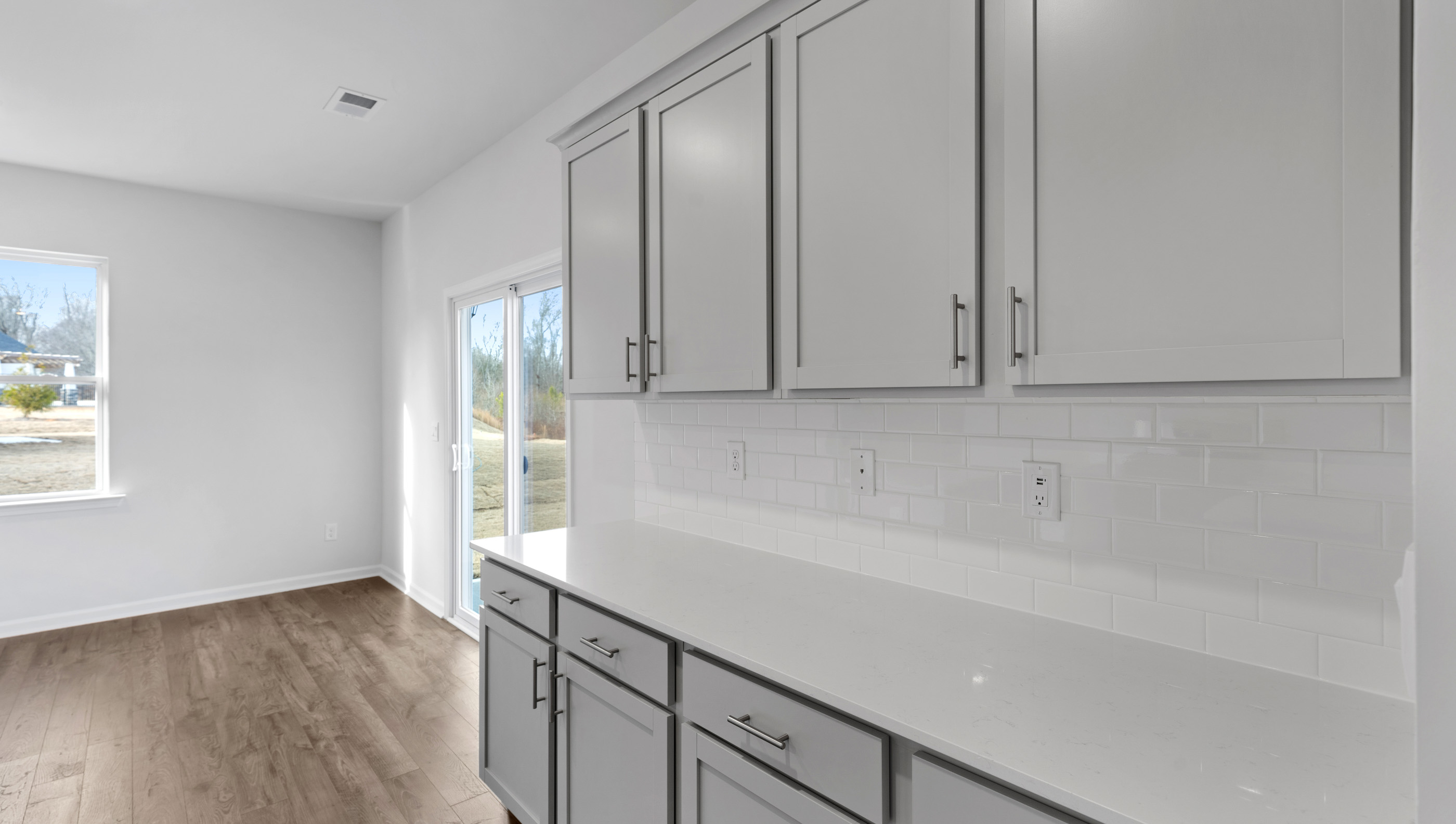 Kitchen cabinets with granite counter tops.
