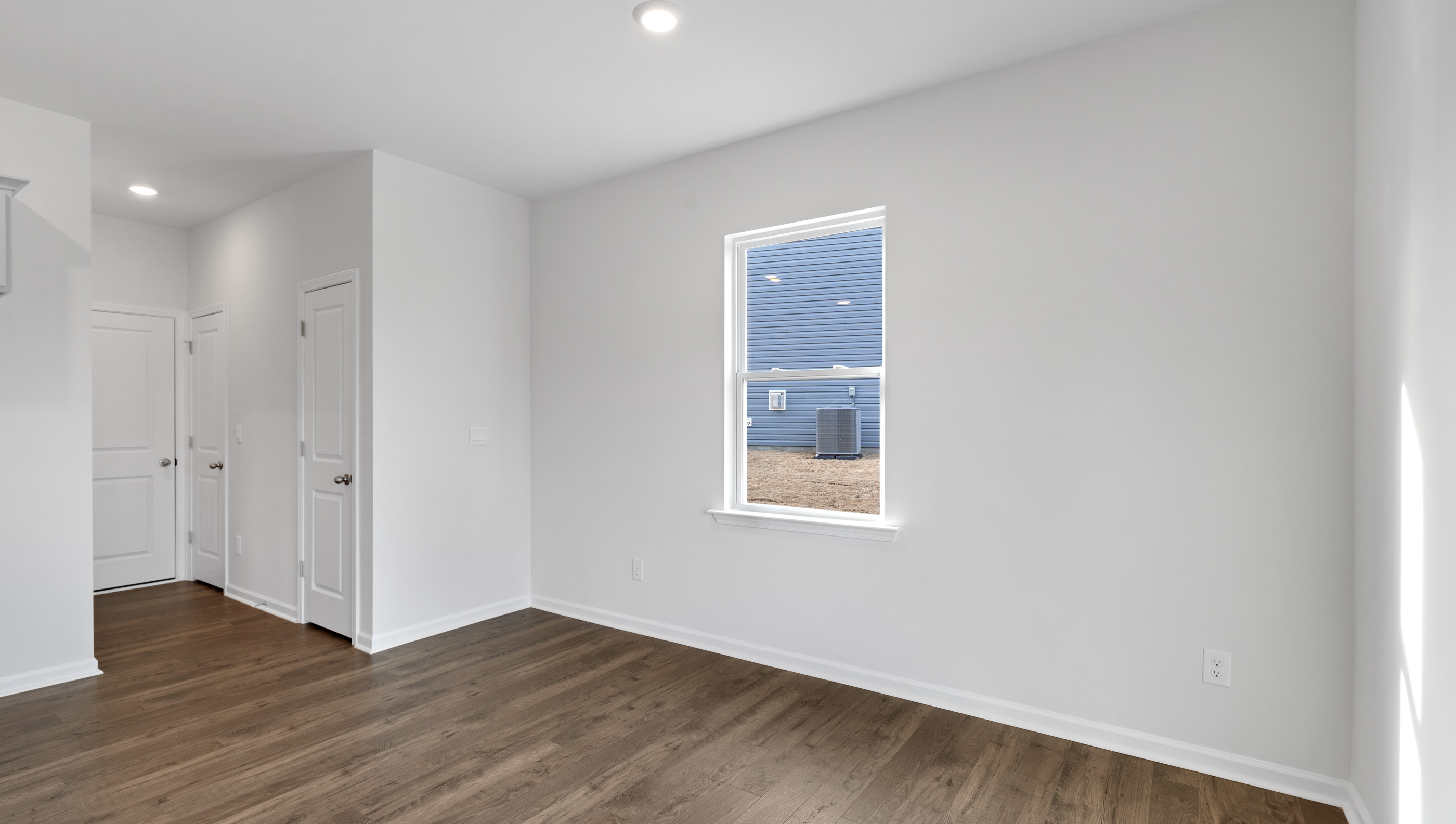 Family room with windows.