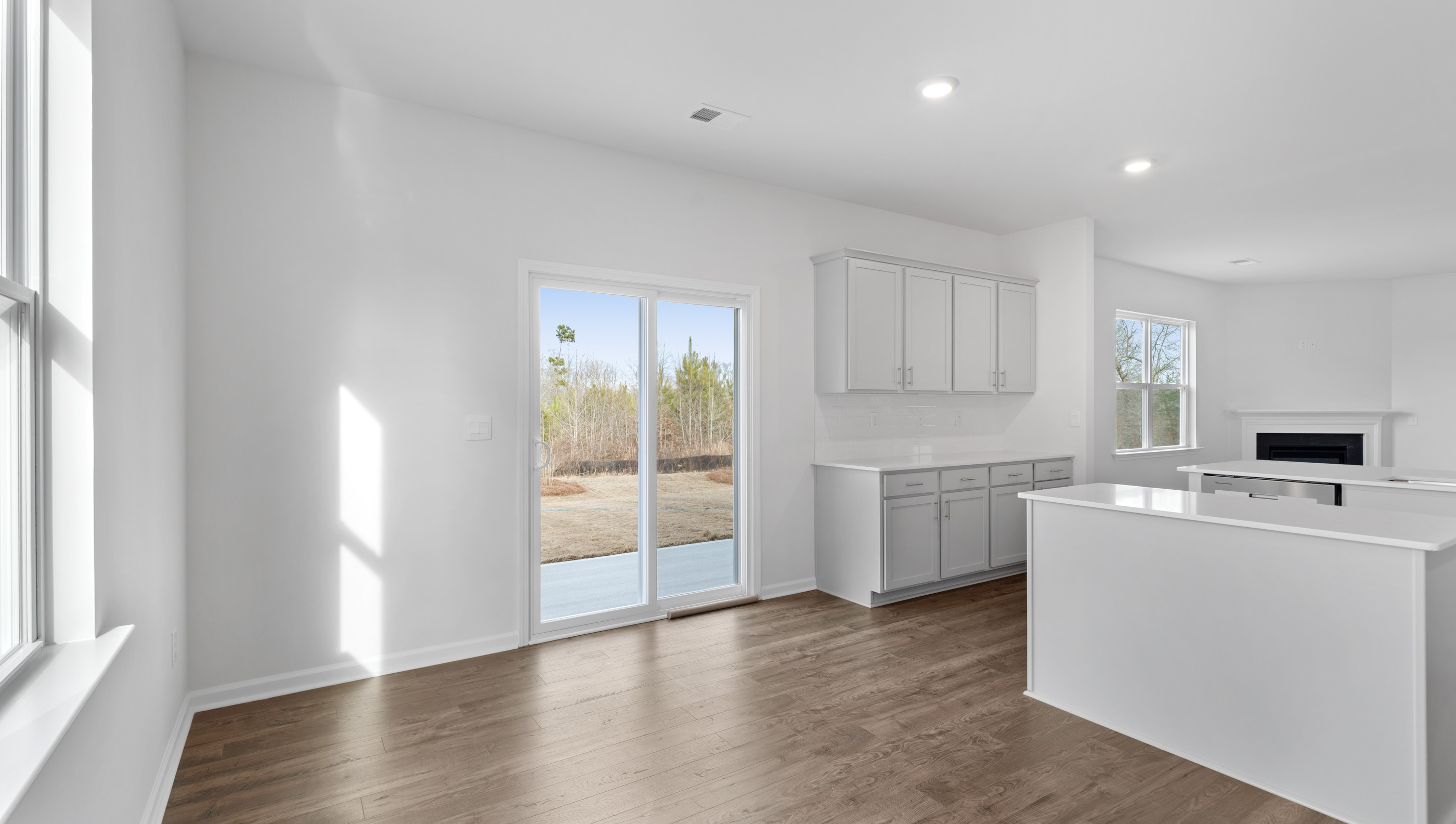 Family room with view of kitchen.