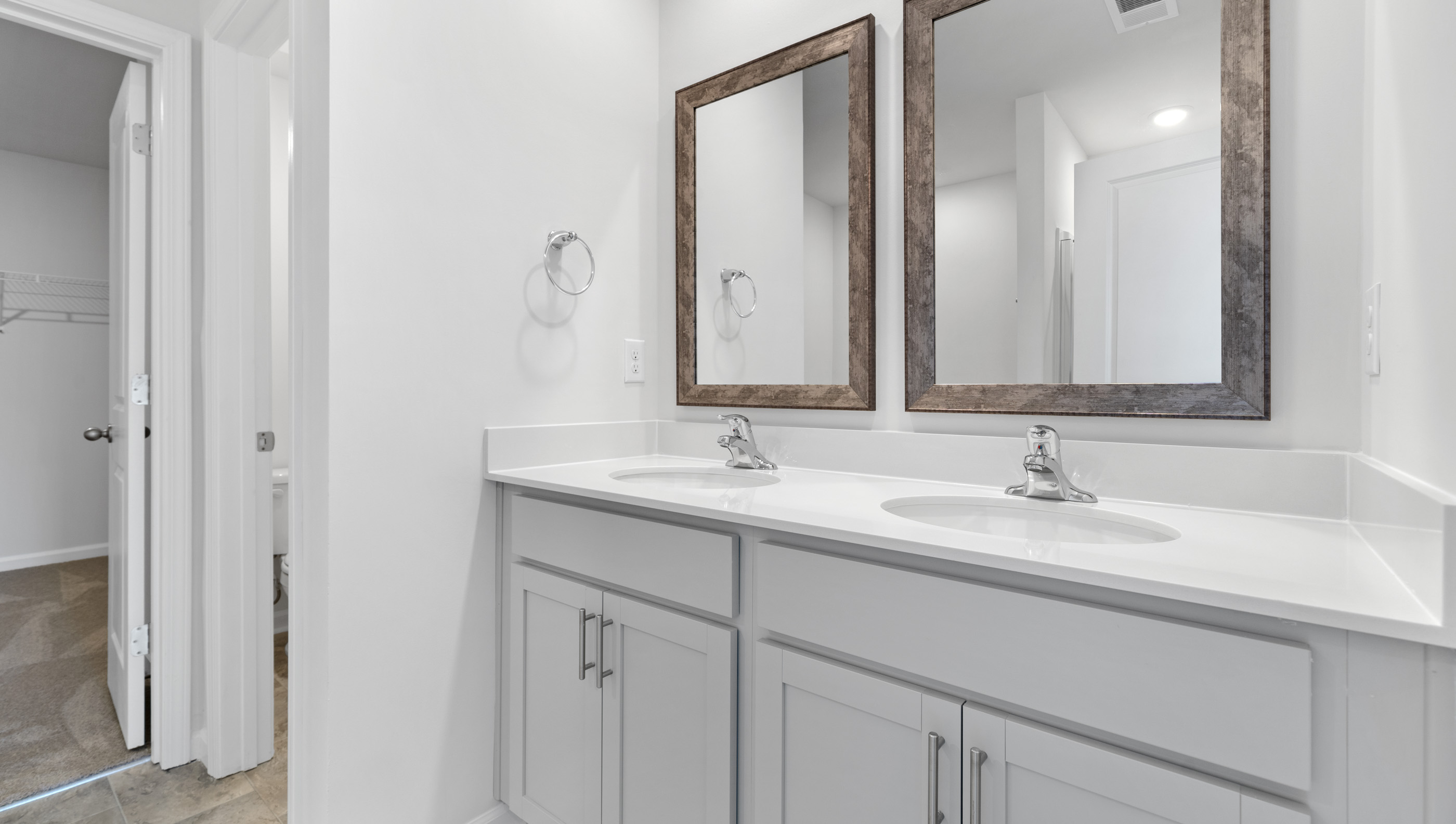 Bathroom with double vanity sink.