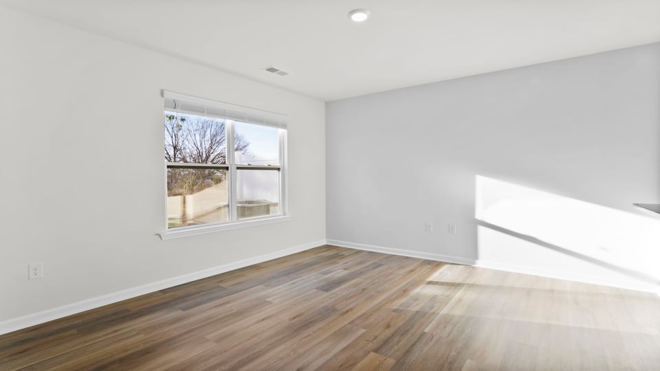 Family room with windows.