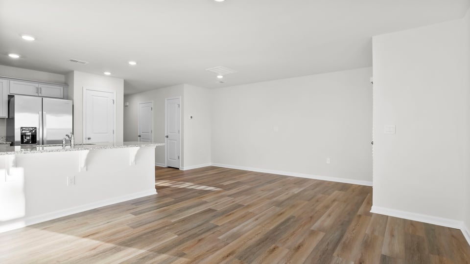 Family room with view of kitchen.
