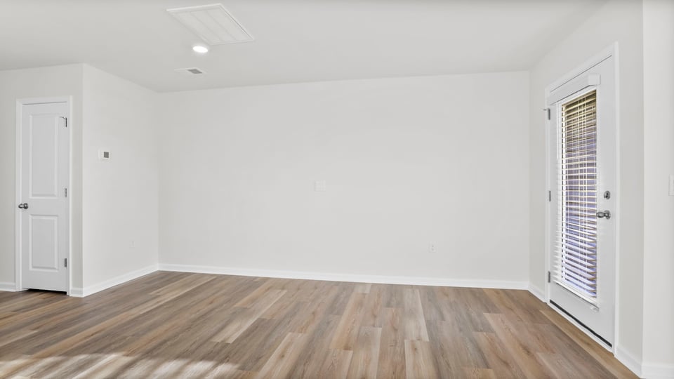 Family room with windows.