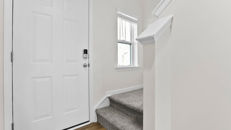 View of stairs to bedroom.