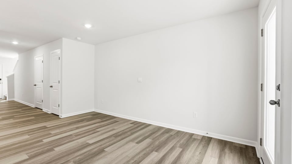 Livingroom with door to backyard.