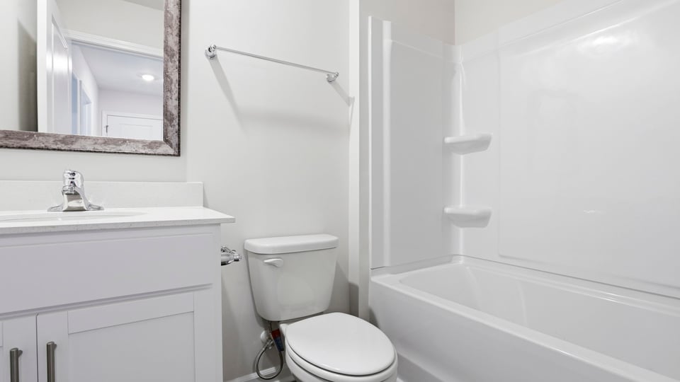 Bathroom with tub and vanity.
