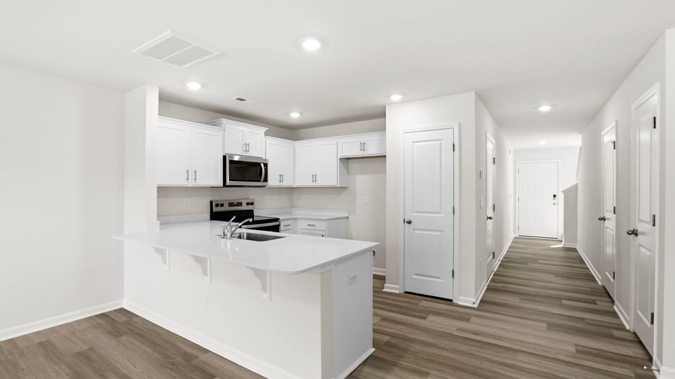 Kitchen with quarts countertops.