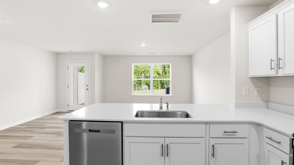Kitchen with quarts countertops.