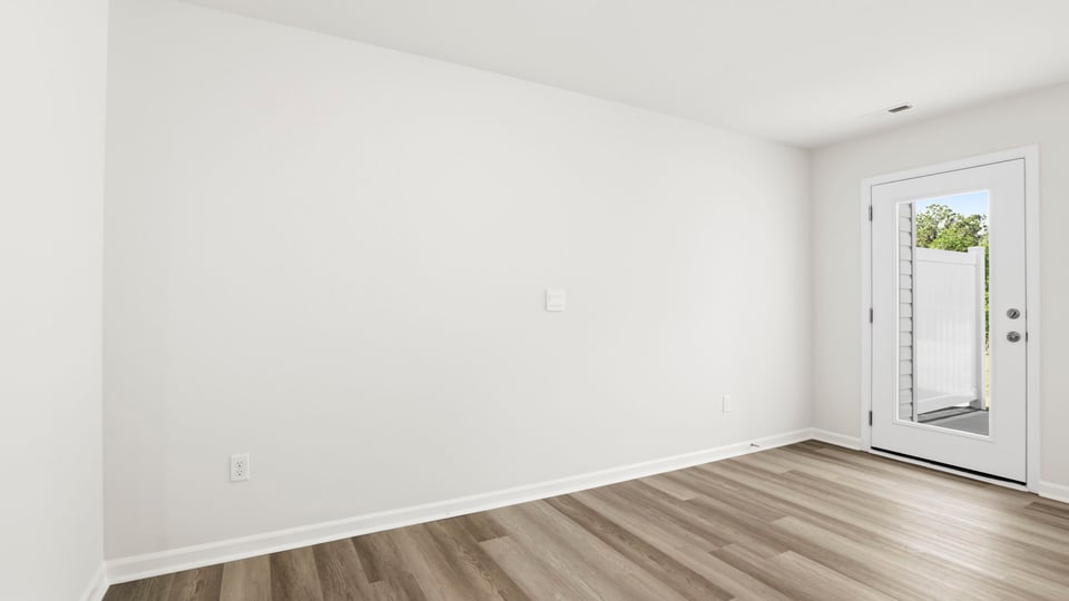 Livingroom with door to patio.