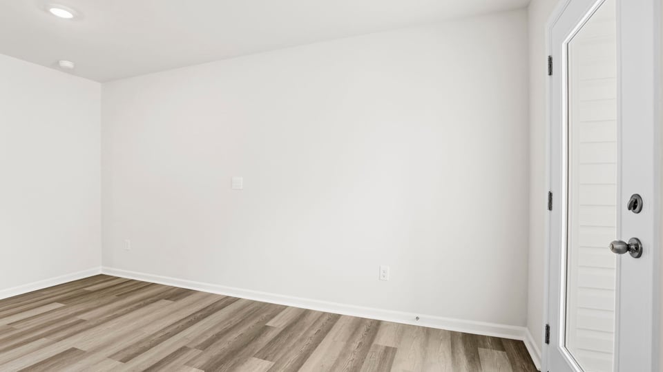 Livingroom with door to patio.