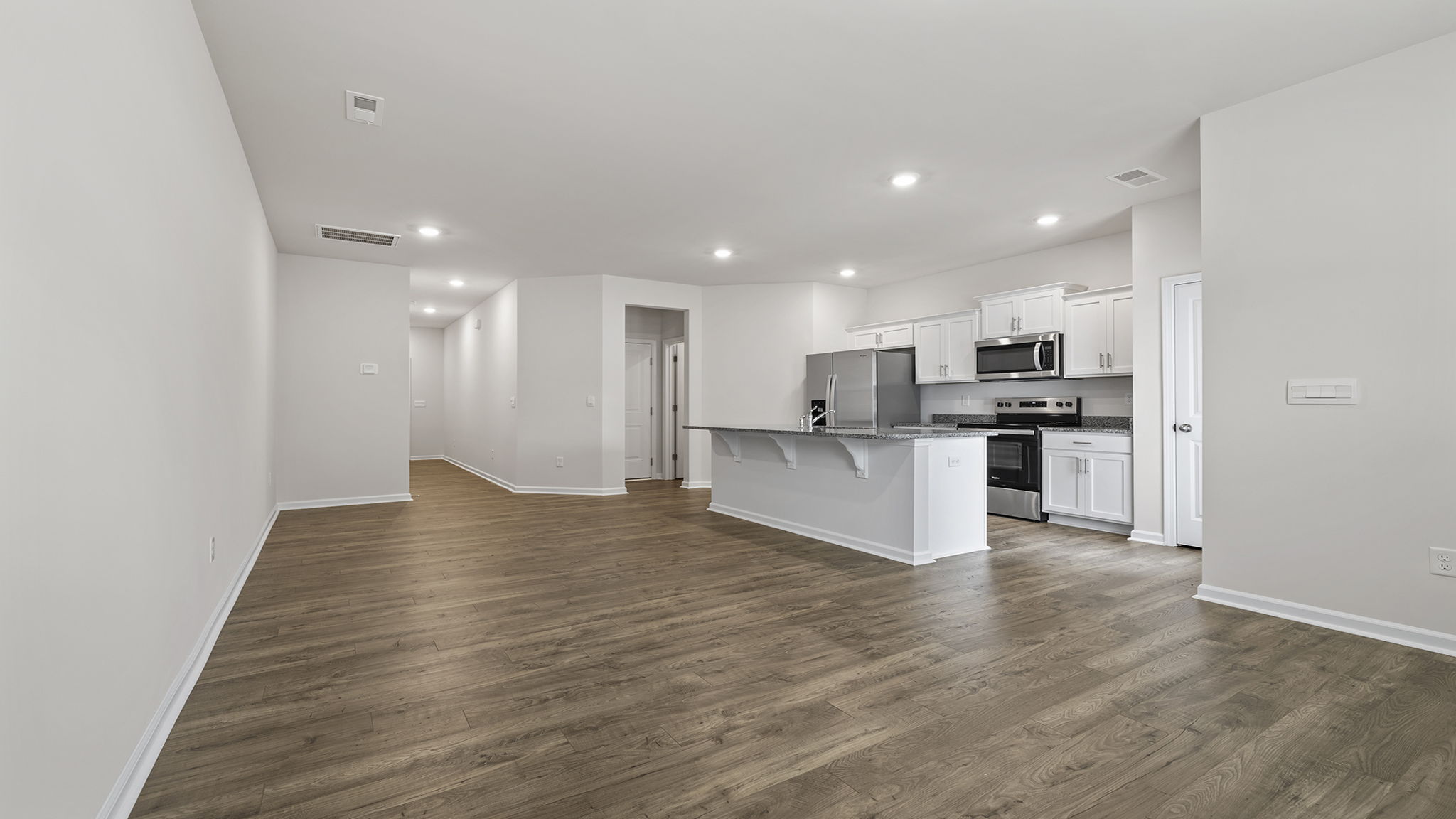 Kitchen with island and countertops.