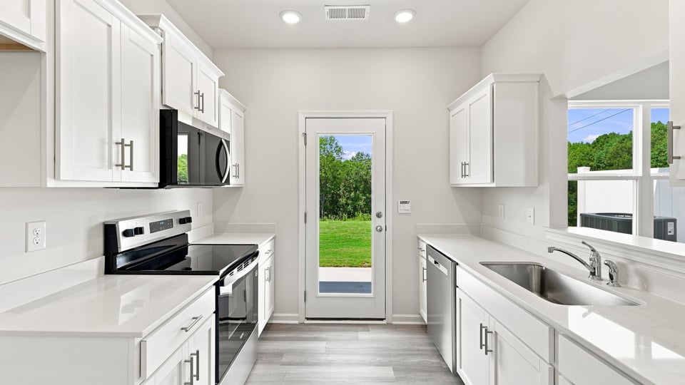 Kitchen with stainless steel appliances.