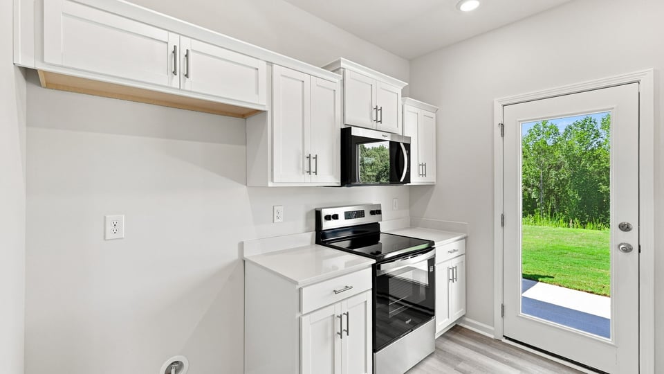 Kitchen with stainless steel appliances.
