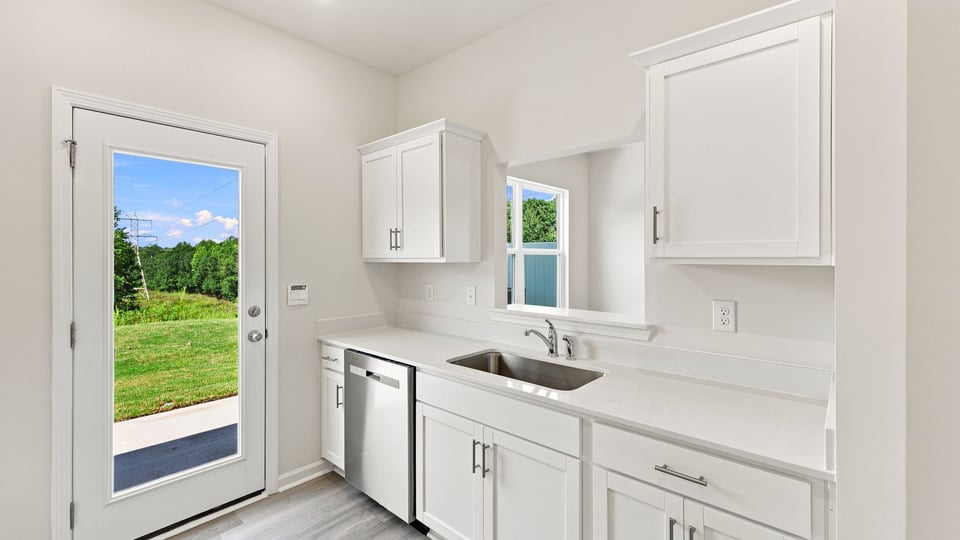 Kitchen with stainless steel appliances.