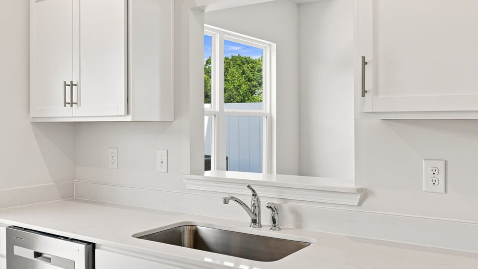 Kitchen with stainless steel appliances.