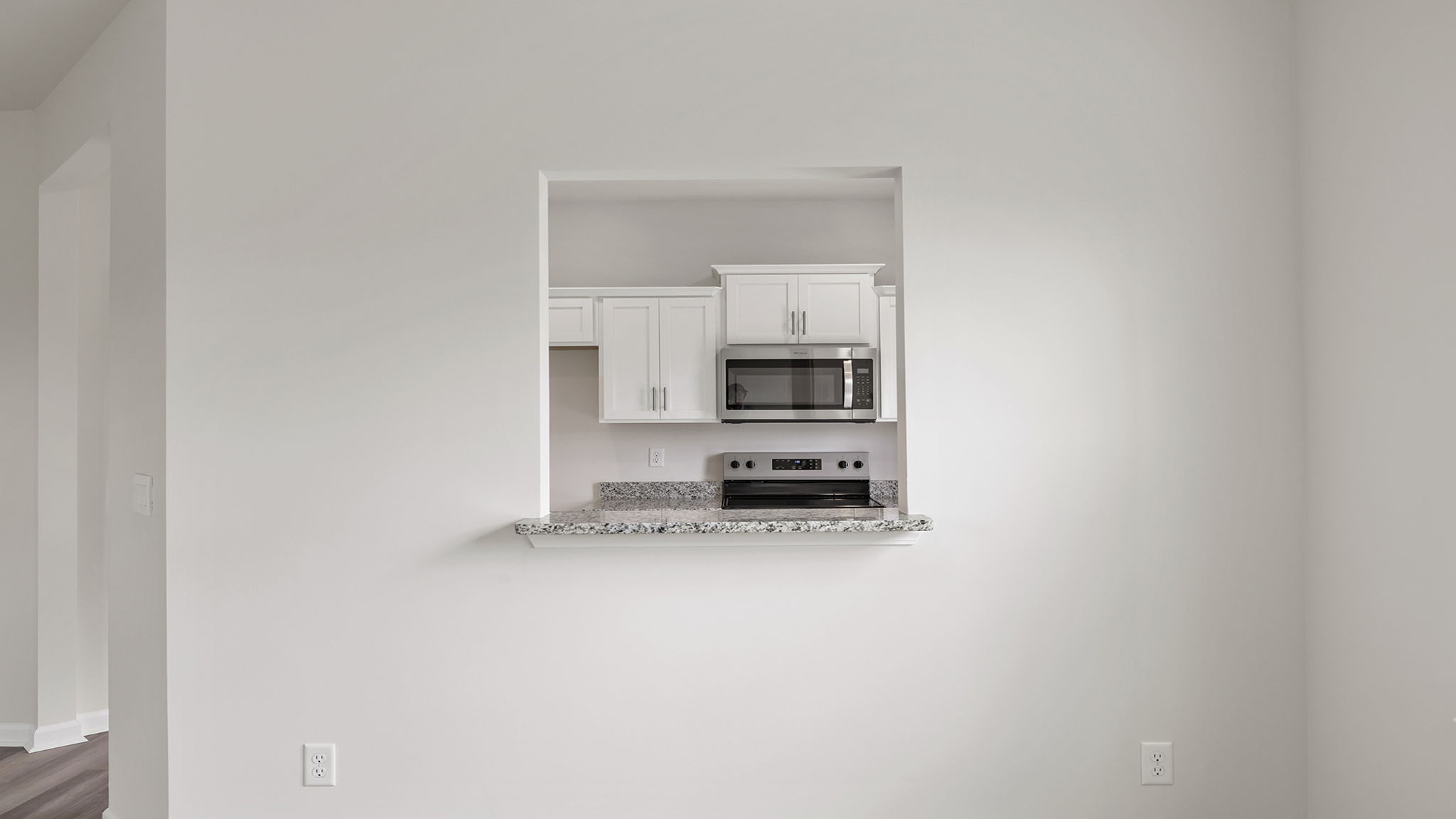 Kitchen window to living room.