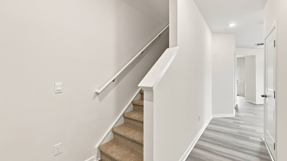 View of stairs to bedroom.