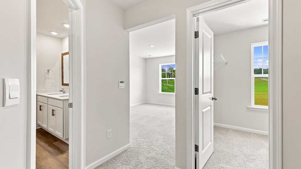 Loft area with carpet.