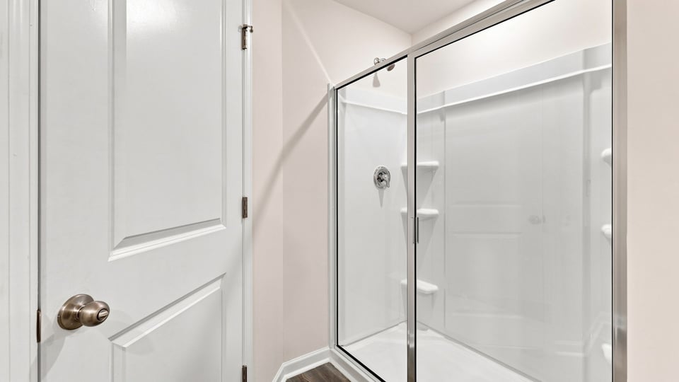 Bathroom with walk in shower.