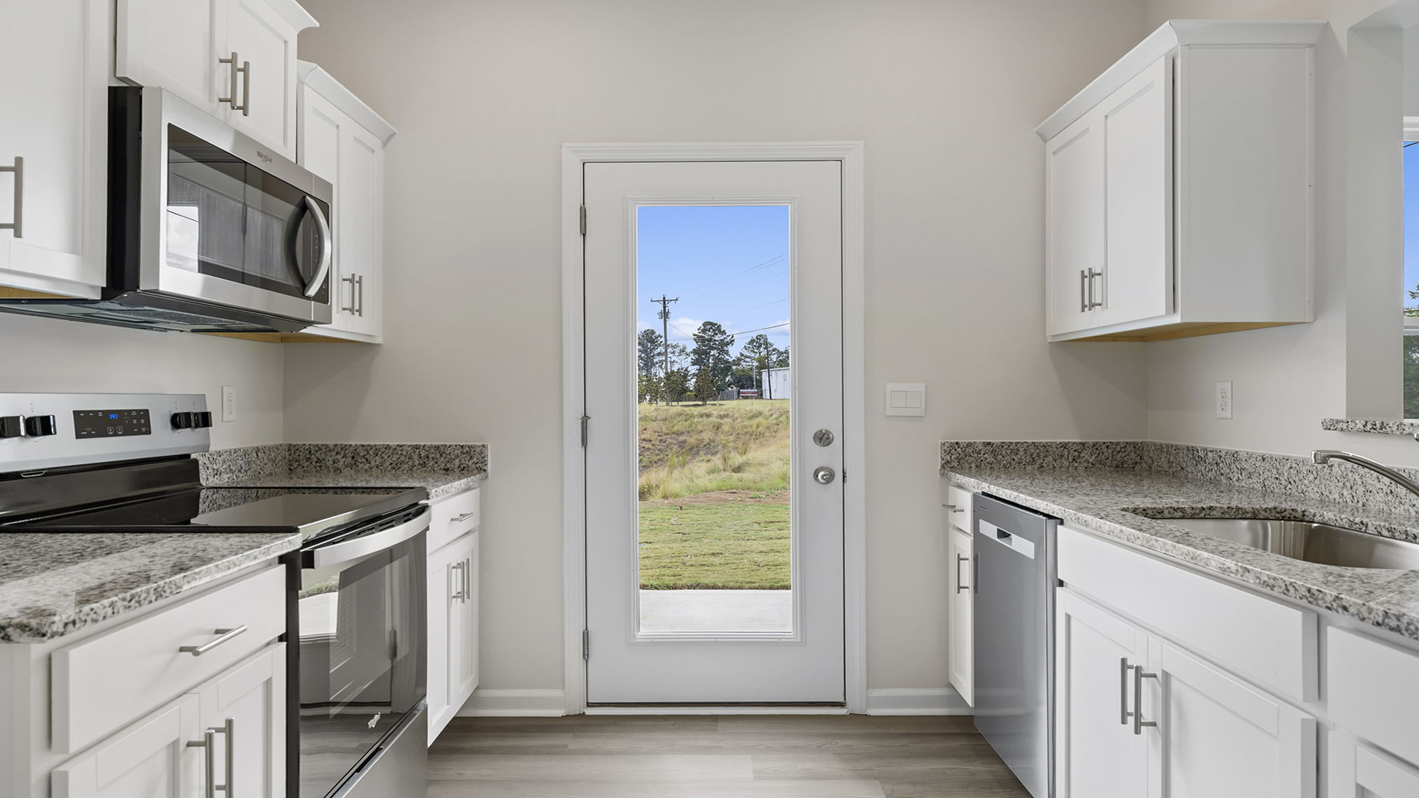 Kitchen with island and countertops.