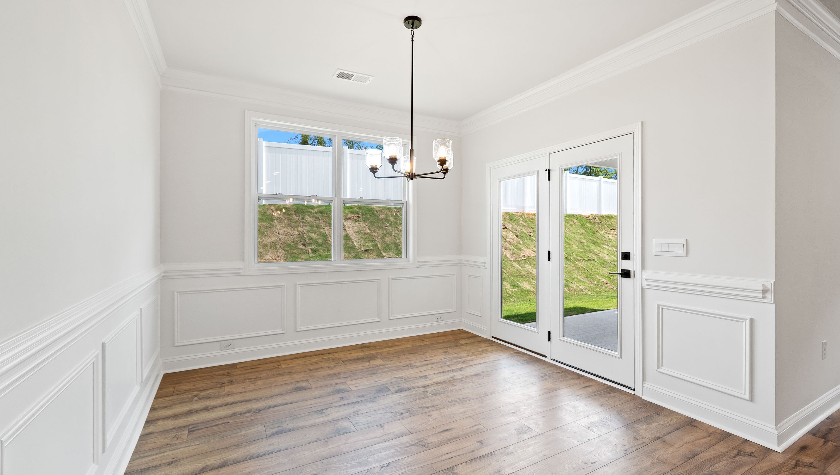 Dining area with door to the outside patio.